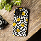 Smiley Checkerboard Tough Phone Case — Retro Wavy Black & White Design