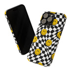 Smiley Checkerboard Tough Phone Case — Retro Wavy Black & White Design